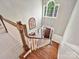 Bright foyer featuring a wood staircase, a large picture window, and views to the outdoors at 2313 Beechwood Dr, Waxhaw, NC 28173