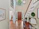 Elegant foyer features a hardwood floor, staircase and natural light at 2313 Beechwood Dr, Waxhaw, NC 28173