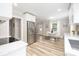 Modern kitchen with stainless steel appliances, quartz countertops, eat in area and updated fixtures at 2414 Remount Rd, Charlotte, NC 28208