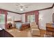 Bedroom with hardwood floors, and a four poster bed at 252 Stamey Farm Rd, Statesville, NC 28677