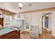 Bedroom showcasing hardwood floors, an upright piano, and quaint decor at 252 Stamey Farm Rd, Statesville, NC 28677