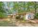 View of the garage building with an artistic car painted on the door at 252 Stamey Farm Rd, Statesville, NC 28677