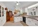 Bright, functional kitchen featuring classic white cabinetry, wood-trimmed countertops and vintage appliances at 252 Stamey Farm Rd, Statesville, NC 28677