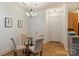 Cozy dining area featuring a glass table and upholstered chairs at 2934 Selwyn Ave, Charlotte, NC 28209