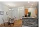 Cozy dining area with a round table and four chairs near the kitchen at 2934 Selwyn Ave, Charlotte, NC 28209
