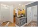 Modern kitchen featuring wooden cabinets and stylish backsplash at 2934 Selwyn Ave, Charlotte, NC 28209
