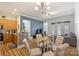 Open living area with kitchen, dining, and sitting spaces with ample light at 2934 Selwyn Ave, Charlotte, NC 28209