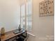 Bright office space with shuttered windows and a modern desk setup at 2934 Selwyn Ave, Charlotte, NC 28209