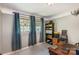 Cozy bedroom featuring neutral walls, a window and a workspace at 3000 Imperial Dr, Gastonia, NC 28054