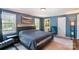 Comfortable main bedroom with neutral carpet, blue walls, large bed, and ensuite access at 3000 Imperial Dr, Gastonia, NC 28054