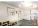 A mud room features storage cabinets, a storage bench and a doorway to the laundry room at 3000 Imperial Dr, Gastonia, NC 28054