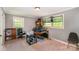 Inviting home office featuring natural light, neutral walls, and space for multiple workstations at 3000 Imperial Dr, Gastonia, NC 28054