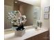 Bathroom boasts a large mirror and vanity with traditional-style cabinets at 3011 Lakewood Edge Dr, Charlotte, NC 28269