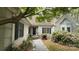 Inviting front entrance with stone walkway and meticulously maintained landscaping at 3011 Lakewood Edge Dr, Charlotte, NC 28269