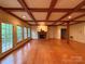 Bright living room with hardwood floors and a classic fireplace, perfect for gatherings at 3011 Lakewood Edge Dr, Charlotte, NC 28269