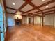 Spacious living room featuring hardwood floors, fireplace, and plenty of natural light at 3011 Lakewood Edge Dr, Charlotte, NC 28269