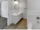 Bathroom with vanity and tile flooring, adjacent to the bathtub at 3114 Parker Green Trl, Charlotte, NC 28269