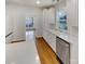 Bright kitchen with white cabinets, stainless steel appliances, and ample counter space at 3114 Parker Green Trl, Charlotte, NC 28269