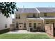 Lovely home exterior with spacious patio, beautiful lawn, offering a serene and private outdoor space at 3214 Park South Station Blvd, Charlotte, NC 28210