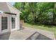 Covered back patio features French doors and lots of natural light for easy access to the beautiful outdoors at 3214 Park South Station Blvd, Charlotte, NC 28210