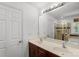 This bathroom features a double vanity and a walk-in shower at 3214 Park South Station Blvd, Charlotte, NC 28210