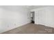 A carpeted bedroom with closet space at 3214 Park South Station Blvd, Charlotte, NC 28210