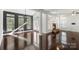 Living room featuring hardwood floors, recessed lights, many windows, and a fireplace at 3214 Park South Station Blvd, Charlotte, NC 28210