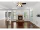 Spacious living room with a fireplace, hardwood floors, and lots of natural light at 3214 Park South Station Blvd, Charlotte, NC 28210