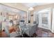 Bright dining room with a glass table, modern chairs, and hardwood floors at 3248 Park South Station Blvd, Charlotte, NC 28210