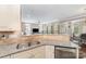 Kitchen with granite countertop, tile backsplash, stainless steel appliances, and hardwood floors at 3248 Park South Station Blvd, Charlotte, NC 28210