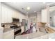 Kitchen featuring stainless steel appliances, granite countertops, and hardwood floors at 3248 Park South Station Blvd, Charlotte, NC 28210