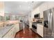 Kitchen with stainless steel appliances, granite countertops, and hardwood floors at 3248 Park South Station Blvd, Charlotte, NC 28210