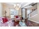Inviting living room with hardwood flooring, elegant furniture, and a bright, open ambiance at 3248 Park South Station Blvd, Charlotte, NC 28210