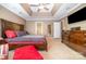 Large main bedroom with tray ceiling, carpet floors, and plenty of space at 3248 Park South Station Blvd, Charlotte, NC 28210