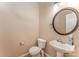 Cozy powder room with modern fixtures, a pedestal sink, and neutral decor at 3882 Shasta Cir, Clover, SC 29710
