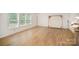 Empty bedroom featuring wood floors and natural light at 3882 Shasta Cir, Clover, SC 29710