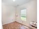 Spare bedroom with wood floors and natural light at 3882 Shasta Cir, Clover, SC 29710