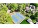 Aerial view of the property, tennis courts and playground at 420 Solomon St, Charlotte, NC 28216