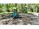 Local playground featuring various play structures and a soft ground surface at 420 Solomon St, Charlotte, NC 28216