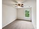 Cozy bedroom with a ceiling fan, neutral carpet and ample natural light at 4222 Mt Gallant Rd, Rock Hill, SC 29732
