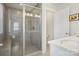 Modern bathroom with a glass-enclosed shower, a built-in bench, and a white vanity at 562 Amalfi Dr, Davidson, NC 28036