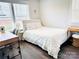 Bright bedroom featuring a comfortable bed, desk and chair with plenty of natural light at 562 Amalfi Dr, Davidson, NC 28036