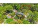Aerial view of property with red boundary lines illustrating property lines within a lush green landscape at 6921 Thermal Rd, Charlotte, NC 28211
