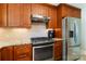 Well-equipped kitchen with stainless steel appliances and ample cabinet space at 6921 Thermal Rd, Charlotte, NC 28211