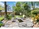 Outdoor patio area featuring stone seating and table for relaxation at 6921 Thermal Rd, Charlotte, NC 28211
