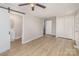 Bedroom with a private bathroom, closet, vinyl floors, and neutral paint at 706 Lowell Ave, Lowell, NC 28098