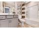 Well-lit bathroom featuring a shower/tub combo, gray vanity, tile floors, and neutral paint at 8030 Downy Oak Ln, Charlotte, NC 28269