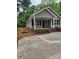 Inviting single-story home featuring a covered porch, perfect for relaxing outdoors at 833 Arlington Ave, Rock Hill, SC 29730