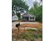 Inviting single story home with a concrete driveway and a classic mailbox at 833 Arlington Ave, Rock Hill, SC 29730