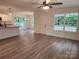 Bright living room with vinyl flooring, new windows and an open floor plan at 833 Arlington Ave, Rock Hill, SC 29730